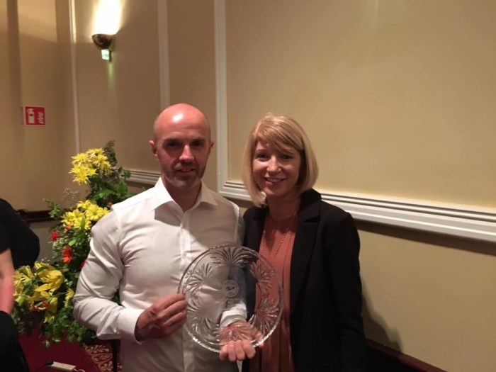 Gerard Maher and Irene Dow accepting the Cobh Community College Community award