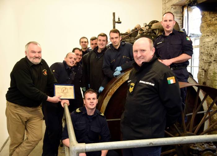 Paul Evans with the Naval Service ERAs and technical trainees who restored the engine