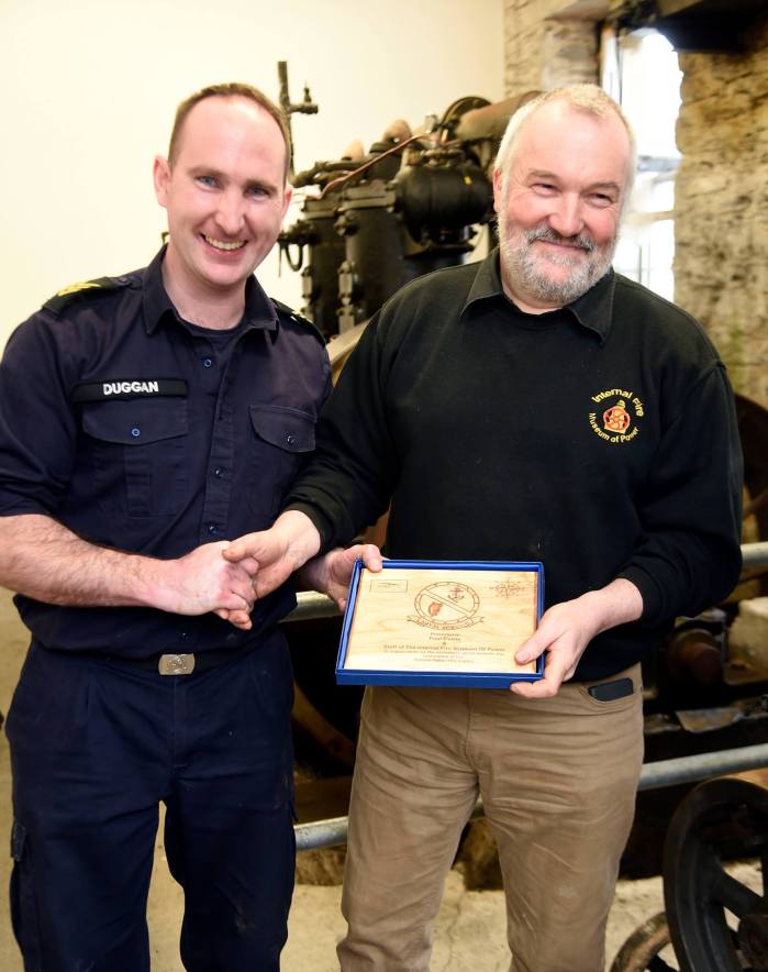 PO/ERA Duggan presenting Mr Paul Evans with a token of appreciation