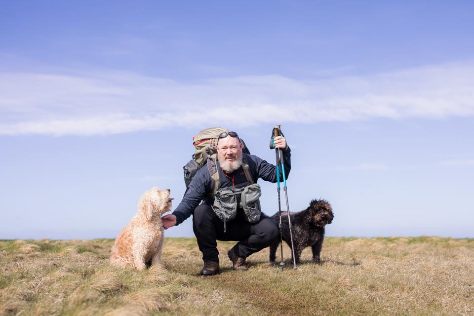 Dermot Cosgrove with the dogs Cookie and Sally